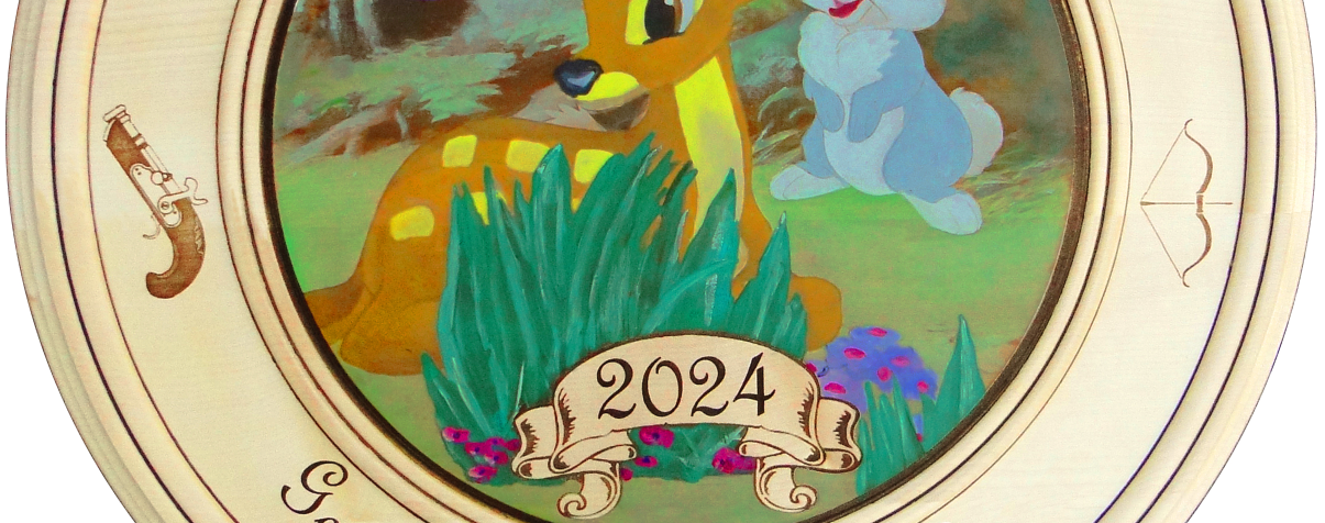 Zum 60. Geburtstag verbindet sie Tradition mit Herz. Bambi und Klopfer symbolisieren Lebensfreude und Freundschaft, eingerahmt von Handböller und Bogen.